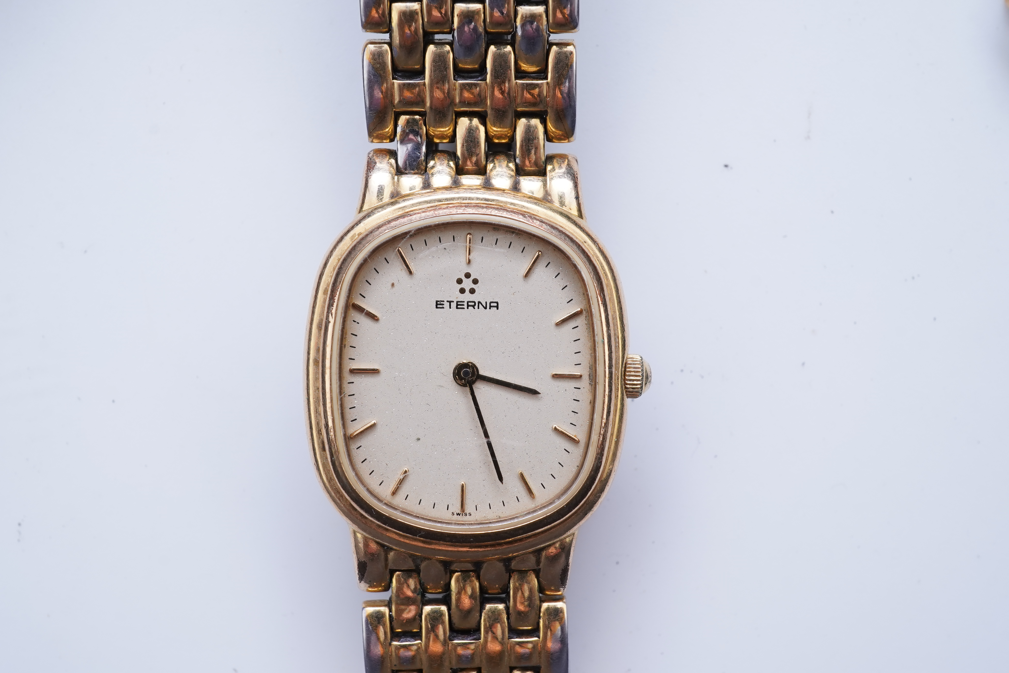 XX REMOVE ROLEX XX, A collection of watches and a bangle, comprising: two Seiko quartz watches; a manual winding watch by Larex; a quartz watch by Eterna; a quartz watch by Rotary; and a quartz watch by Pulsar; together